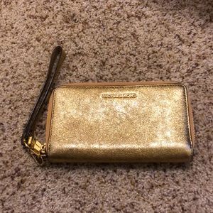 Michael Kors gold wristlet